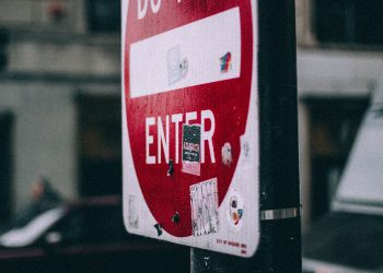 closeup photo of white and red do not enter signage